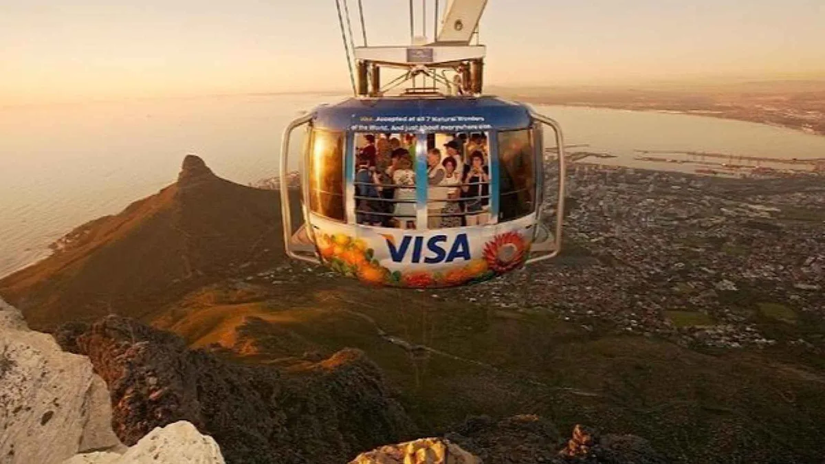 Chapman's Peak Drive winding above the ocean on a Table Mountain and Cape Point combo tour, Cape Town