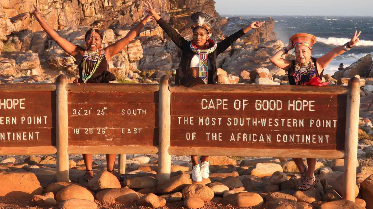 Private guide and travellers at the Cape of Good Hope sign on a full-day private tour from Cape Town